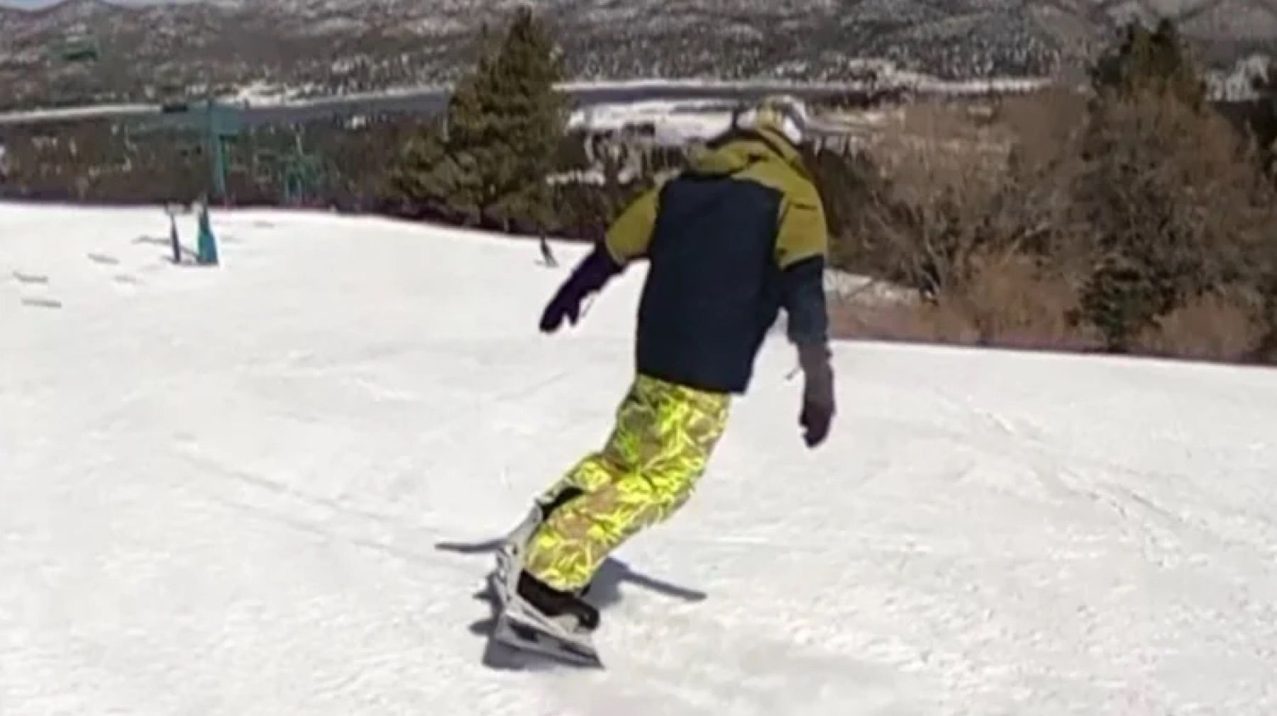 Neil snowboarding